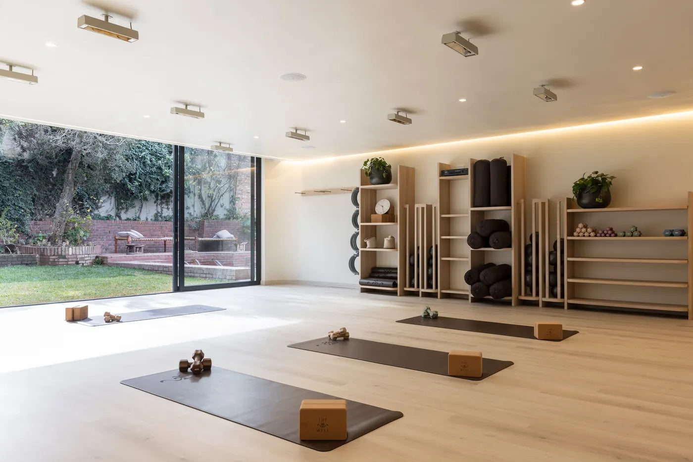 Bright yoga and movement studio with natural light at The Well