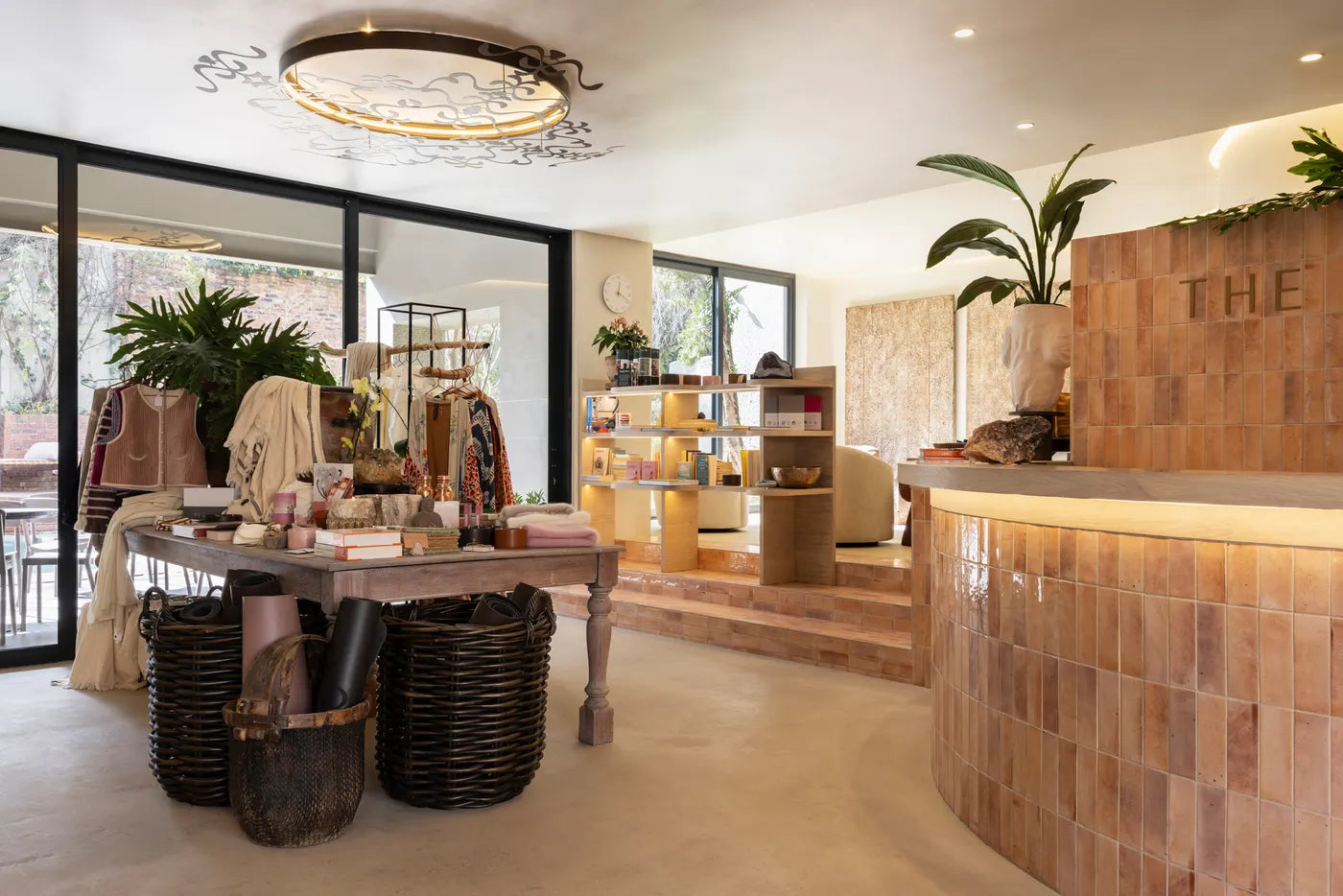 Curated wellness retail shelves at The Well at Nine Yards